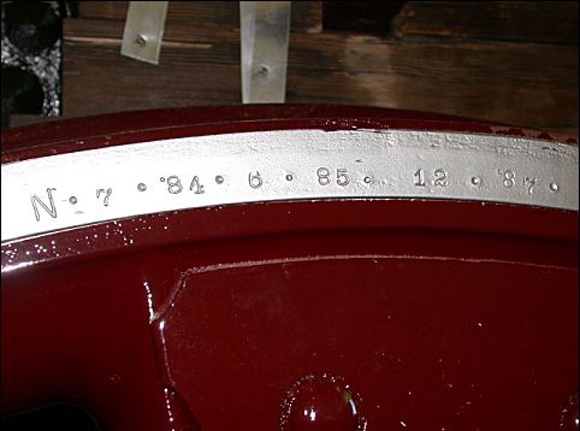 Cold-stamped numbers were found on the metal wheels indicating the dates they were worked on.